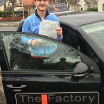 Jack Hoban-showing-driving-test-practical-pass-certificate